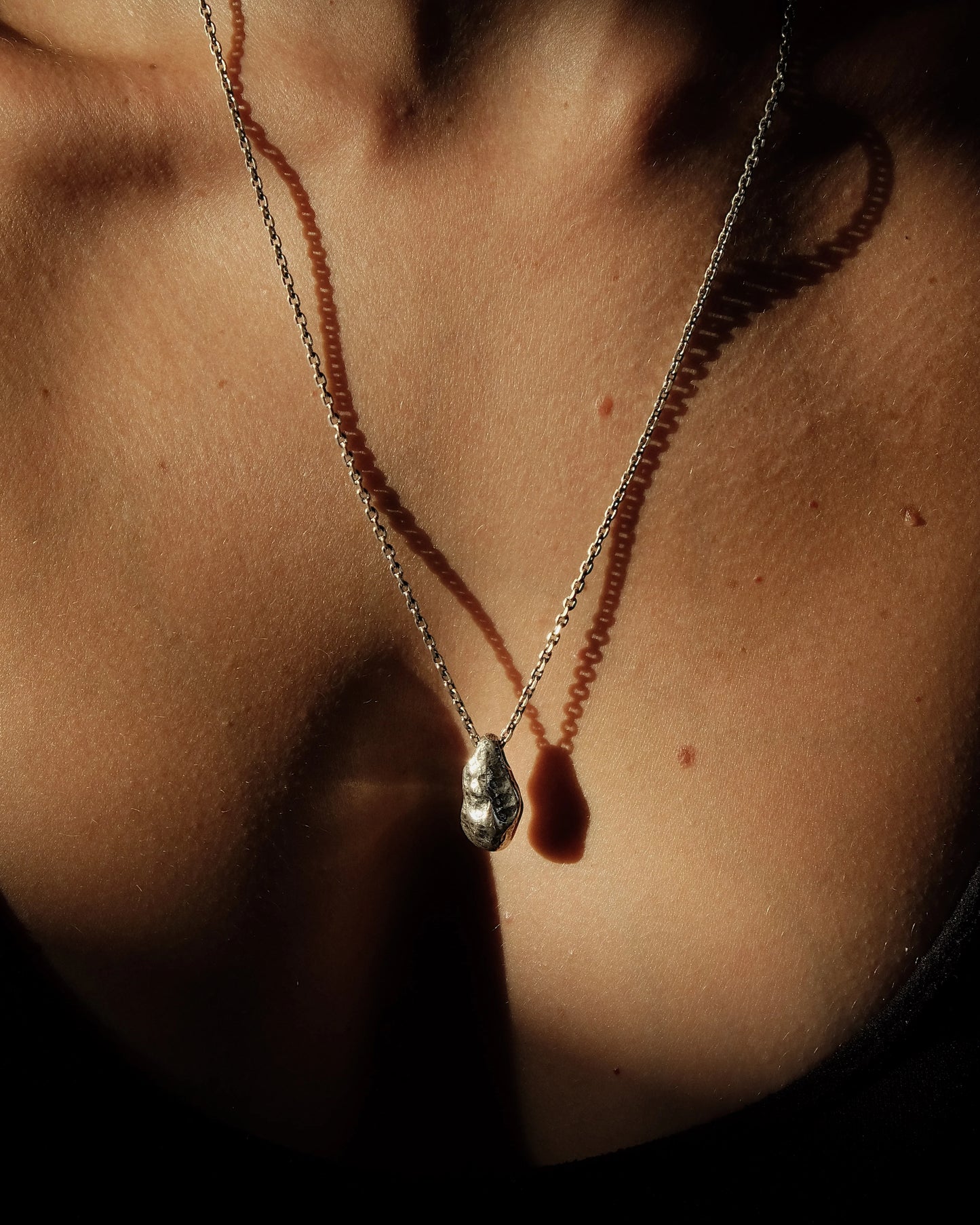 THE STONE NECKLACE
