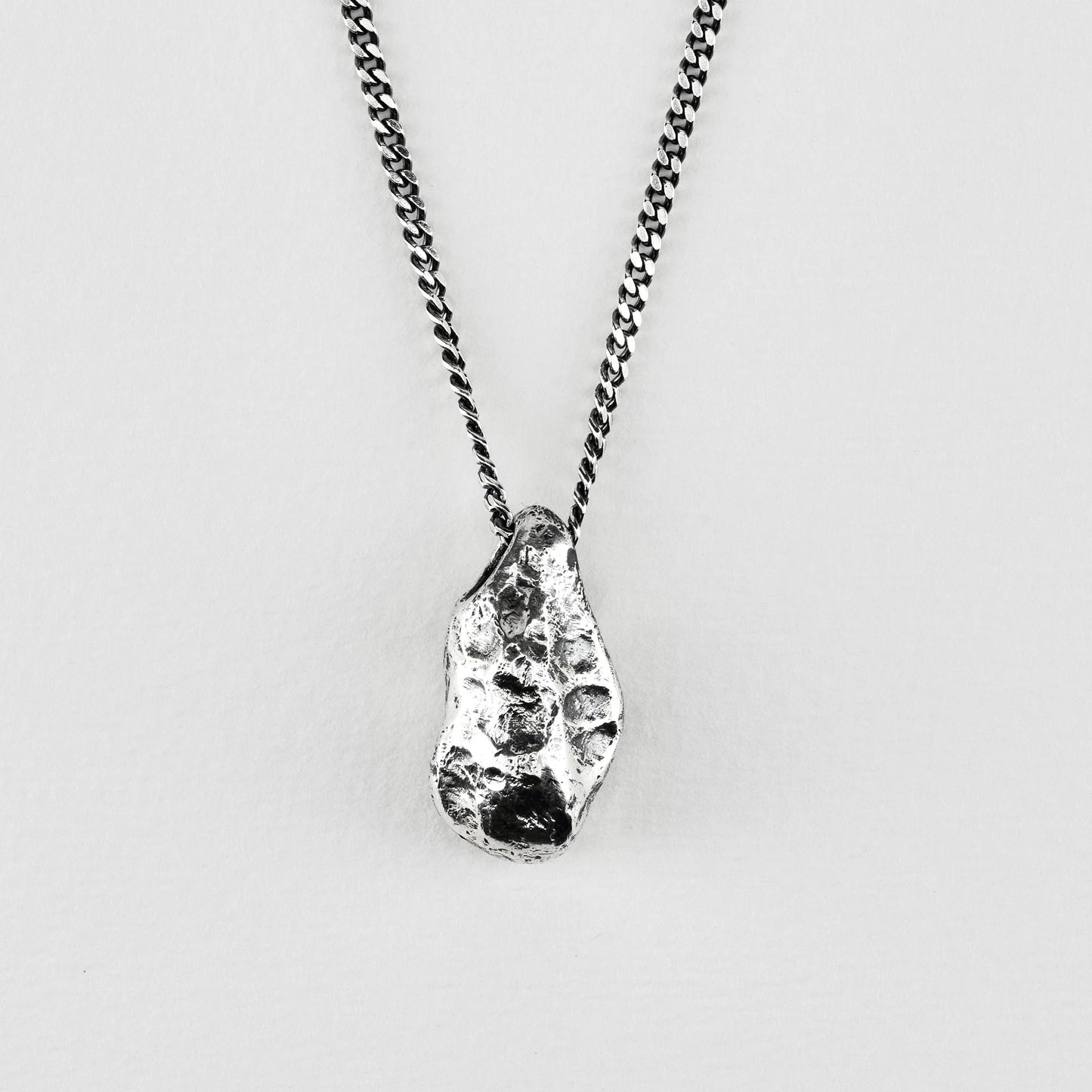 THE STONE NECKLACE