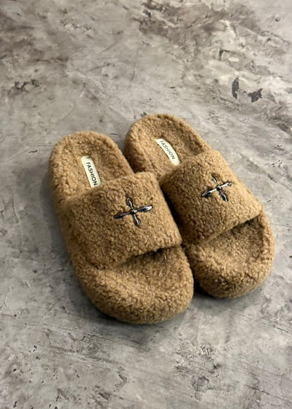CURLY FLIP FLOPS
