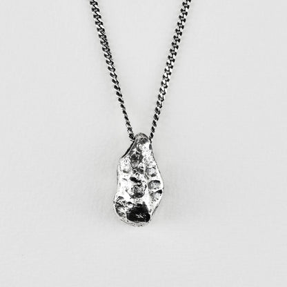 THE STONE NECKLACE